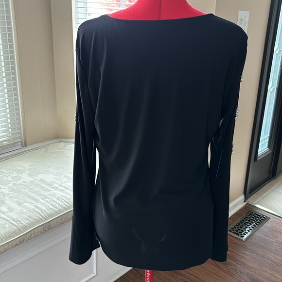 Black polyester/spandex blend, with embellished sleeves. - Picture 3 of 9